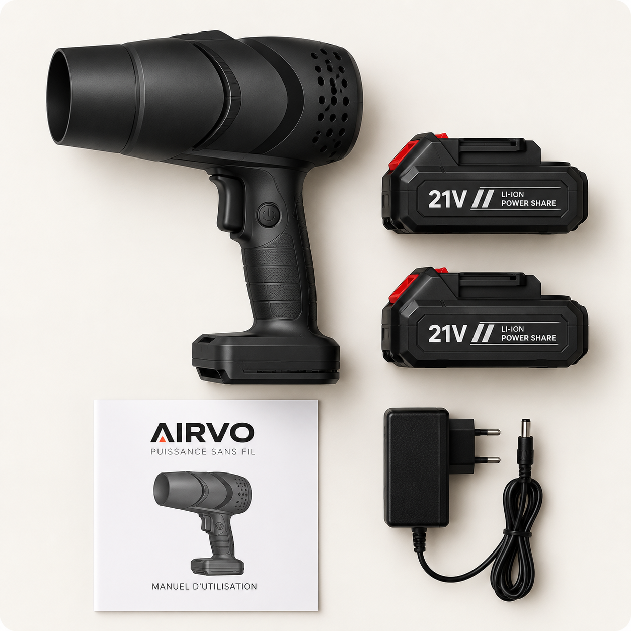 Kit AIRVO vu du dessus avec un souffleur, deux batteries, un chargeur et un manuel
